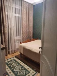 Ένα ή περισσότερα κρεβάτια σε δωμάτιο στο Guest House SALI