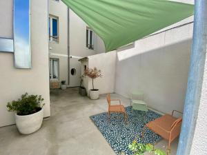 Vonkajšia záhrada v ubytovaní La Cabane du Parc