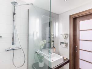 a bathroom with a shower and a sink at Mercure Napoli Centro Angioino in Naples
