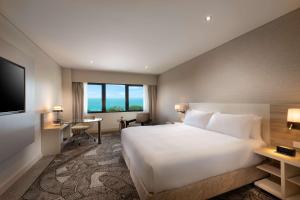 Vuode tai vuoteita majoituspaikassa Hilton Darwin