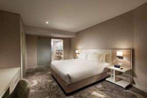 Vuode tai vuoteita majoituspaikassa Hilton Darwin
