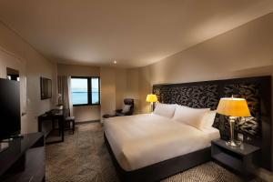 Vuode tai vuoteita majoituspaikassa Hilton Darwin
