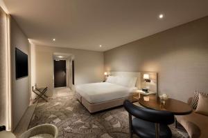 Vuode tai vuoteita majoituspaikassa Hilton Darwin