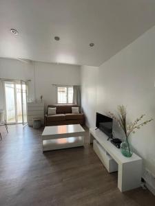 En eller flere senge i et værelse på Charmant logement à Romainville