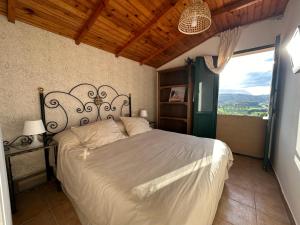 Ένα ή περισσότερα κρεβάτια σε δωμάτιο στο Increíble Casita Gallega.