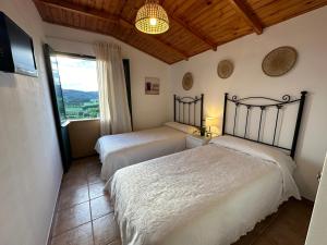 Ένα ή περισσότερα κρεβάτια σε δωμάτιο στο Increíble Casita Gallega.