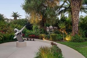 A garden outside TRYP by Wyndham Corfu Dassia