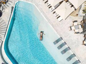 Majoituspaikassa Fairmont Doha tai sen lähellä sijaitseva uima-allas