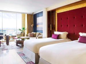 Katil atau katil-katil dalam bilik di Raffles Dubai