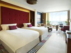 Katil atau katil-katil dalam bilik di Raffles Dubai