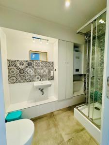 Kúpeľňa v ubytovaní Design Apartments