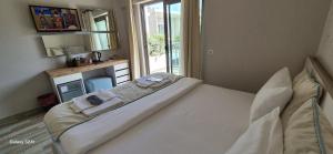 Кровать или кровати в номере The D Hotel Çeşme Resort