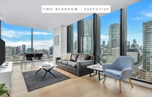 Area soggiorno di Melbourne Lifestyle Apartments - Best Views on Collins