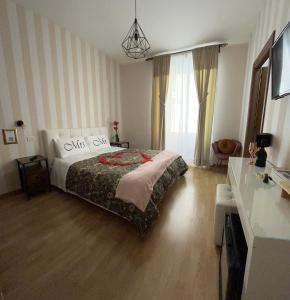 Posteľ alebo postele v izbe v ubytovaní Monti49 GuestHouse