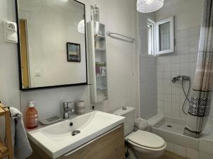 Ванна кімната в En ville avec un air de campagne
