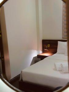 Letto o letti in una camera di Hong Nhan Hotel