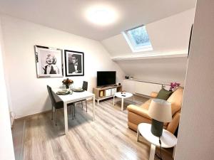 TV a/nebo společenská místnost v ubytování Appartement Near Belval