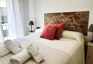 Un pat sau paturi într-o cameră la El Encanto de Miraflores
