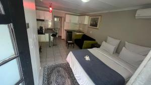 Η κουζίνα ή μικρή κουζίνα στο RAMATA GUEST HOUSE