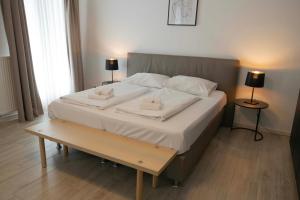 Posteľ alebo postele v izbe v ubytovaní easy flat Mariahilf City Living