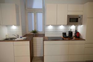 Kuchyňa alebo kuchynka v ubytovaní easy flat Mariahilf City Living