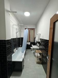 Χώρος καθιστικού στο Trilocale con cucina - Casa Manzoni