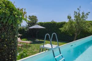 Πισίνα στο ή κοντά στο Nature home in villa w piscina