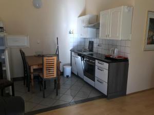 Kuchyň nebo kuchyňský kout v ubytování Apartment Pero