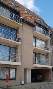 Budova, kde se apartmán nachází + 1 fotografie