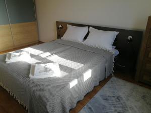 Postel nebo postele na pokoji v ubytování Sapphire Mountain 2