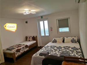 Posteľ alebo postele v izbe v ubytovaní Casa Dașoveanu