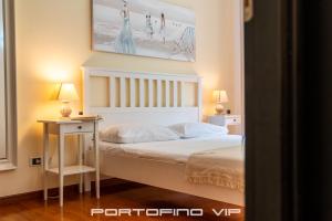 Postel nebo postele na pokoji v ubytování Attico by PortofinoVip