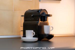 Příslušenství pro přípravu čaje a kávy v ubytování Attico by PortofinoVip