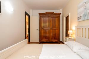 Postel nebo postele na pokoji v ubytování Attico by PortofinoVip