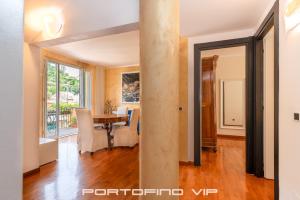TV a/nebo společenská místnost v ubytování Attico by PortofinoVip