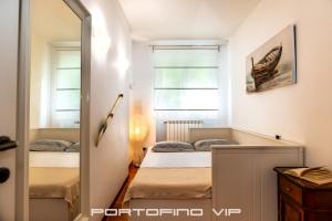 Postel nebo postele na pokoji v ubytování Attico by PortofinoVip
