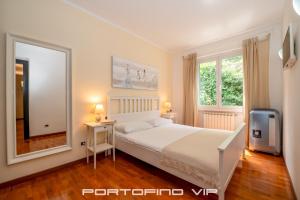 Postel nebo postele na pokoji v ubytování Attico by PortofinoVip