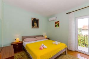 Posteľ alebo postele v izbe v ubytovaní Rooms Ante