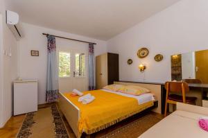 Posteľ alebo postele v izbe v ubytovaní Rooms Ante