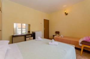 Posteľ alebo postele v izbe v ubytovaní Rooms Ante