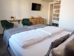 Postel nebo postele na pokoji v ubytování Hotel Sleep & Dream Nähe Europa Park und Rulantica