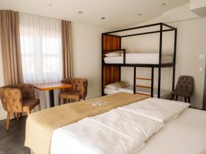 Postel nebo postele na pokoji v ubytování Hotel Sleep & Dream Nähe Europa Park und Rulantica