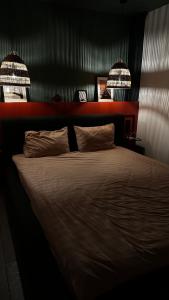 Postel nebo postele na pokoji v ubytování Барнхаус - ваш будинок мрії