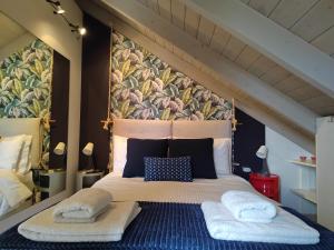 Posteľ alebo postele v izbe v ubytovaní Argostoli loft