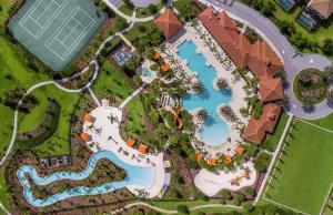 an overhead view of a pool at a resort at Solterra Resort Home - Waterslide and Lazy River in Davenport