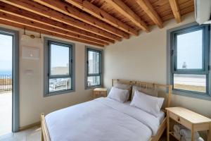 Postel nebo postele na pokoji v ubytování Siwar Boutique Suites