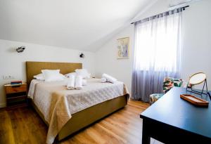 Postel nebo postele na pokoji v ubytování Kuća za odmor LAVANDA