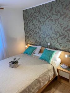 Кровать или кровати в номере Apartments Sestanka