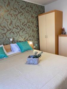 Кровать или кровати в номере Apartments Sestanka
