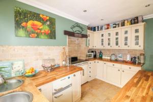 Køkken eller tekøkken på Marwood Cottage + 5 billeder